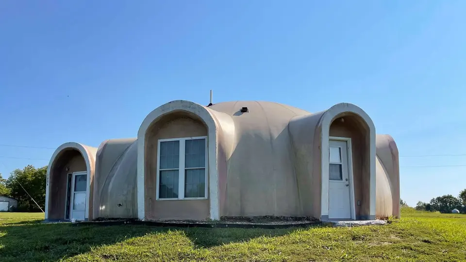 Image of the twin Monolithic Dome home for sale in Missouri.