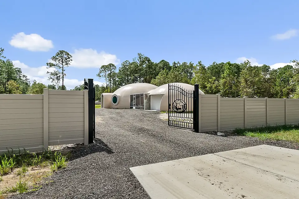 Monolithic Dome House Surrounded by Trees